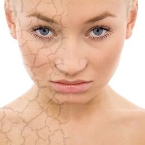 portrait of a beautiful woman with face care concept